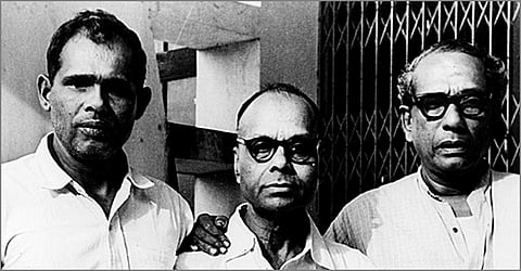 Kuttipuzha Krishna Pillai (center) with Thakazhi and Mundassery