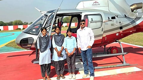 rajasthan principal treats class toppers with helicopter ride