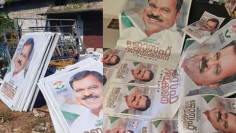 No name in candidate list; printed banner and poster are useless