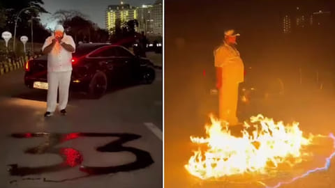 man sets part of road on fire with petrol in mumbai