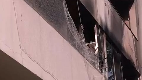 9 killed many rescued after massive fire at residential building in delhi