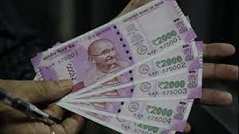 Rupee trades in narrow range against US dollar