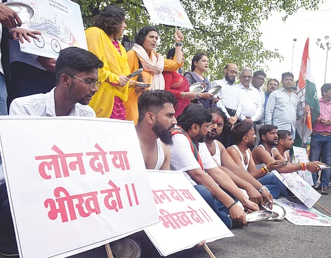 Youth Congress workers stage a protest against the launching of the State Government's youth policy in Bhopal on Thursday.