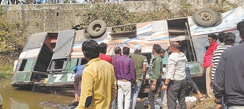 Two killed as bus  falls into ditch