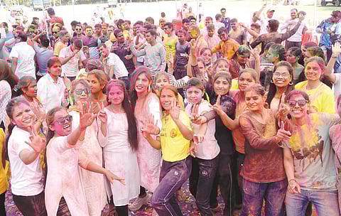 Women cops play Holi at the District Reserve Police Line in Bhopal on Thursday. Police Holi is celebrated a day after the Holi festival.