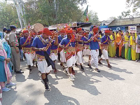 Enthused artistes displaying Bhagoria dance before the arrival of Chief Minister Shivraj Singh Chouhan in Alirajpur on Monday.