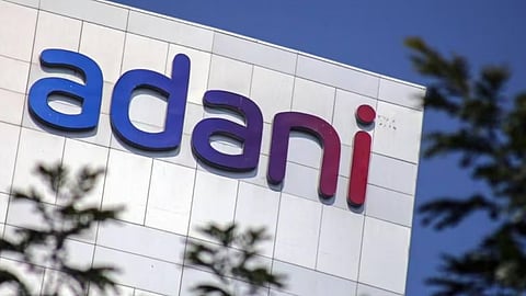 Eight Adani Group companies settle with gains; Adani Enterprises rallies 5%
