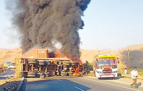 2 killed as container collides with two vehicles