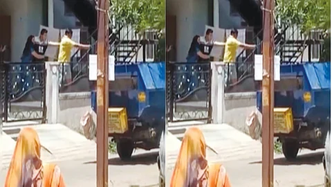 Gun pointed at worker over garbage mixing