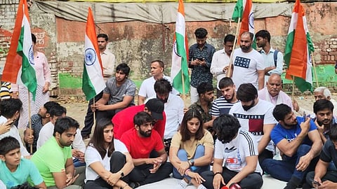 Wrestlers return to protest site, demand release of panel report on sexual harassment allegations against WFI chief