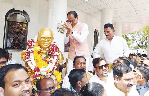 Chief Minister Shivraj Singh Chouhan pays tribute to Dr BR Ambedkar on his 132nd birth anniversary at his birth place in Mhow on Friday.