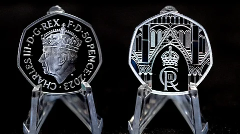 Hundred newly-minted 50pence pieces worth £50 bearing King's image swapped for sword at Coronation