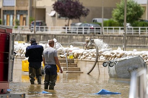 Five dead as heavy rains in northern Italy burst riverbanks, flood towns