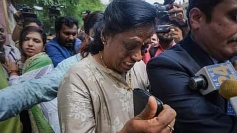 PT Usha assaulted at protest site (Video)