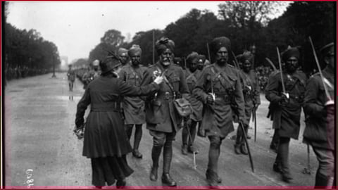 French President Emmanuel Macron has gifted Prime Minister Narendra Modi a framed facsimile of a 1916 photograph of a Parisian presenting flowers to a Sikh officer