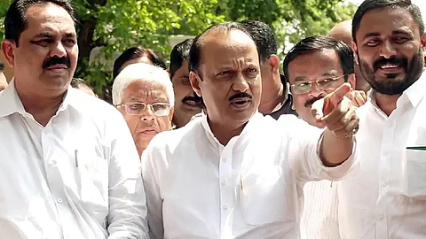 Ajit Pawar (centre)
