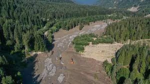 A landslide hit a resort area in the mountains of the country of Georgia, killing at least seven people and leaving more than 30 missing, officials and news reports said Friday.