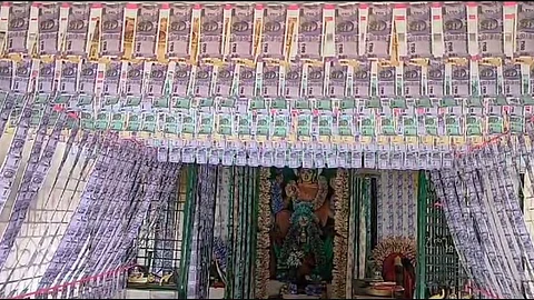 Goddess Durga Malleswari decorated with currency notes worth 30 lakhs in Anakapalli