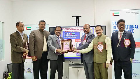 Dr. Suresh Kumar Madhusudhanan, CMD of Seagull International Group, rceives award from Prof. (Dr.) Elango Rengasamy, Associate Dean & Head of Quality Assurance, Global Business Studies, Dubai, UAE.
