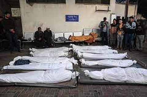 Gaza families search for bodies buried in rubble as Israeli missile strikes devastate the region