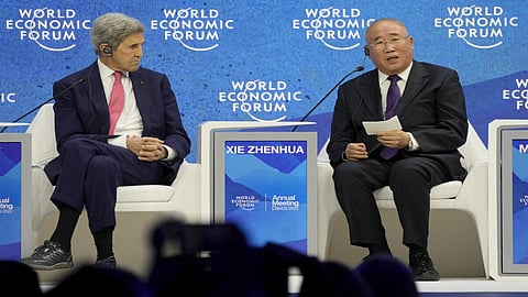 John Kerry with his Chinese counterpart Xie Zhenhua
