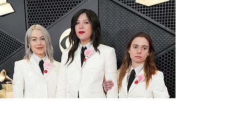 Phoebe Bridgers, from left, Lucy Dacus, and Julien Baker of boygenius arrive at the 66th annual Grammy Awards on Sunday, Feb. 4, 2024, in Los Angeles.