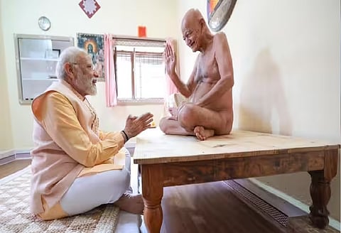PM Modi and Jain seer' file photo
