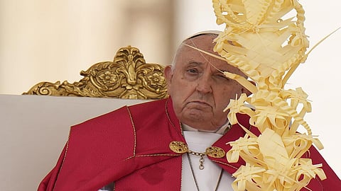 Pope Francis celebrates the Palm Sunday Mass in St. Peter’s Square at the Vatican on Sunday.