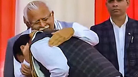 New Haryana Chief Minister Nayab Singh Saini with former state chief minister Manohar Lal Khattar during his oath taking ceremony on Tuesday, March 12, 2024.