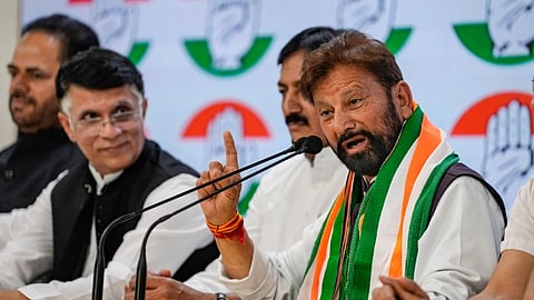 Former MP from Udhampur Lal Singh addresses media after joining Congress in the presence of Congress leader Pawan Khera, at AICC Headquarters in New Delhi, Wednesday, March 20, 2024.