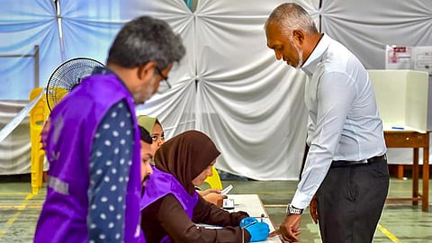 Maldives President Mohamed Muizzu casts his ballot for parliamentary election at a polling station in Mali, Maldives, Sunday, April 21, 2024.