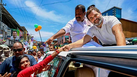 Congress leader Rahul Gandhi during an election campaign road show for the Lok Sabha polls, in Wayanad, Kerala, Monday, April 15, 2024.