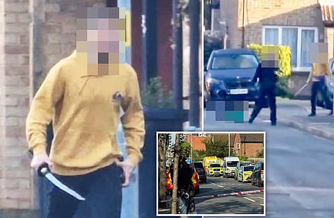 Man with sword , east London Tube station,