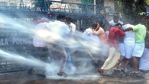 Security personnel use water cannon to disperse Youth Congress activists during their protest demanding a CBI probe into the death of Sidharthan JS, a second-year student of the Kerala Veterinary & Animal Sciences University, outside the Kerala Secretariat, in Thiruvananthapuram, Thursday, March 7, 2024.