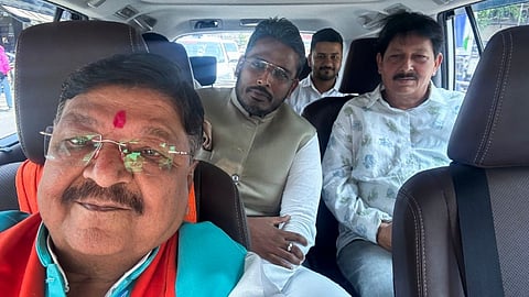 BJP leader Kailash Vijayvargiya with Congress candidate from Indore Lok Sabha seat Akshay Kanti Bam. Bam has withdrawn his candidature, an official said on Monday.