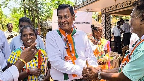 Congress candidate from South Goa constituency Viriato Fernandes being greeted by a party leader, in Goa.