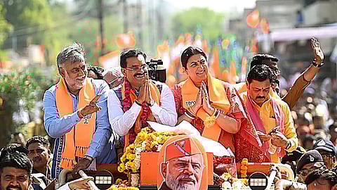 Union Ministers Smriti Irani and Prahlad Patel with BJP candidate VD Sharma during a rally before the latter files his nomination papers ahead of Lok Sabha elections, in Panna, Madhya Pradesh, Wednesday, April 3, 2024.