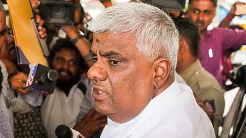 JD(S) MLA H.D. Revanna being brought for medical check-up at a government hospital, a day after he was taken into custody by officials of a Special Investigation Team in a kidnapping case, in Bengaluru, Sunday, May 5, 2024.