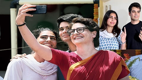 Miraya Vadra and Raihan Vadra with their mother Priyanka Vadra after casting vote