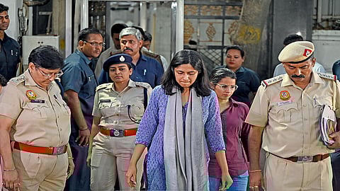 AAP MP Swati Maliwal (centre) along with Delhi Police