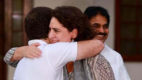 Congress party leaders Rahul Gandhi and Priyanka Gandhi Vadra hugs each other before the media after a meeting at party President Mallikarjun Kharge's residence, in New Delhi, Monday, June 17, 2024. General Secretary KC Venugopal seen nearby.