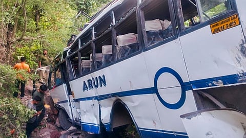 The damaged bus after it plunged into a gorge following an alleged attack by suspected terrorists, in Reasi district of Jammu and Kashmir, Sunday, June 9, 2024.
