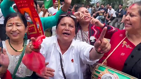 Sikkim Krantikari Morcha (SKM) supporters celebrate after party's victory in the Sikkim Assembly elections, in Gangtok, Sunday, June 2, 2024.