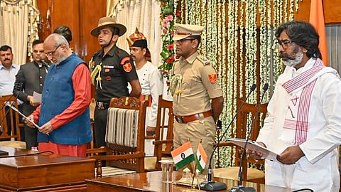 Jharkhand Governor CP Radhakrishnan administers the oath of office and secrecy to Jharkhand Mukti Morcha (JMM) leader Hemant Soren as the 13th Chief Minister of Jharkhand during the swearing-in Ceremony at the Raj Bhavan, in Ranchi, Thursday, July 4, 2024.