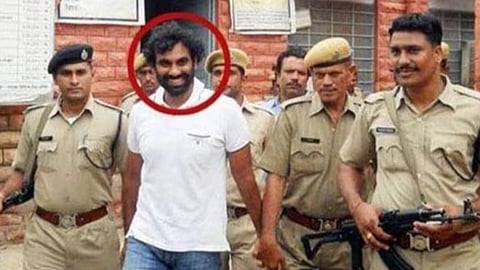 Gangster Anandpal in police custody.