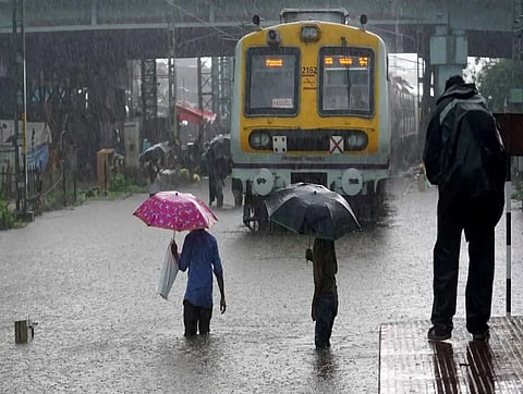 Heavy rains in Mumbai leads to waterlogging on roads, delays trains; two more lakes overflow
