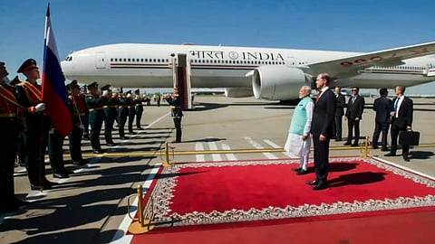 Prime Minister Narendra Modi recieves a ceremonial welcome upon his arrival at the airport, in Moscow.