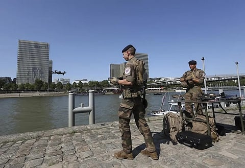 French troops secure the River Seine for the Paris Olympics opening ceremony
