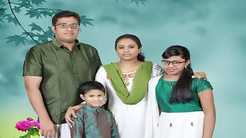 Mathew Muzhakkal, his wife Lini Abraham and their children Isaac and Erin.
