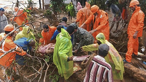 Recovering the bodies from the Wayanad landslide location